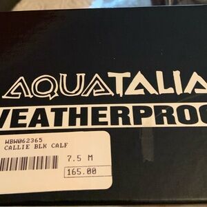 Women’s black leather zipper front waterproof shoes-worn only a few times